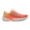 New Balance Zapatilla Running Fuelcell Rebel v5 Naranja Tangerine Heat Hombre