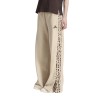ADIDAS Pantalón Chándal Essential Animal Print 3-Stripes Joggers Beige  Mujer